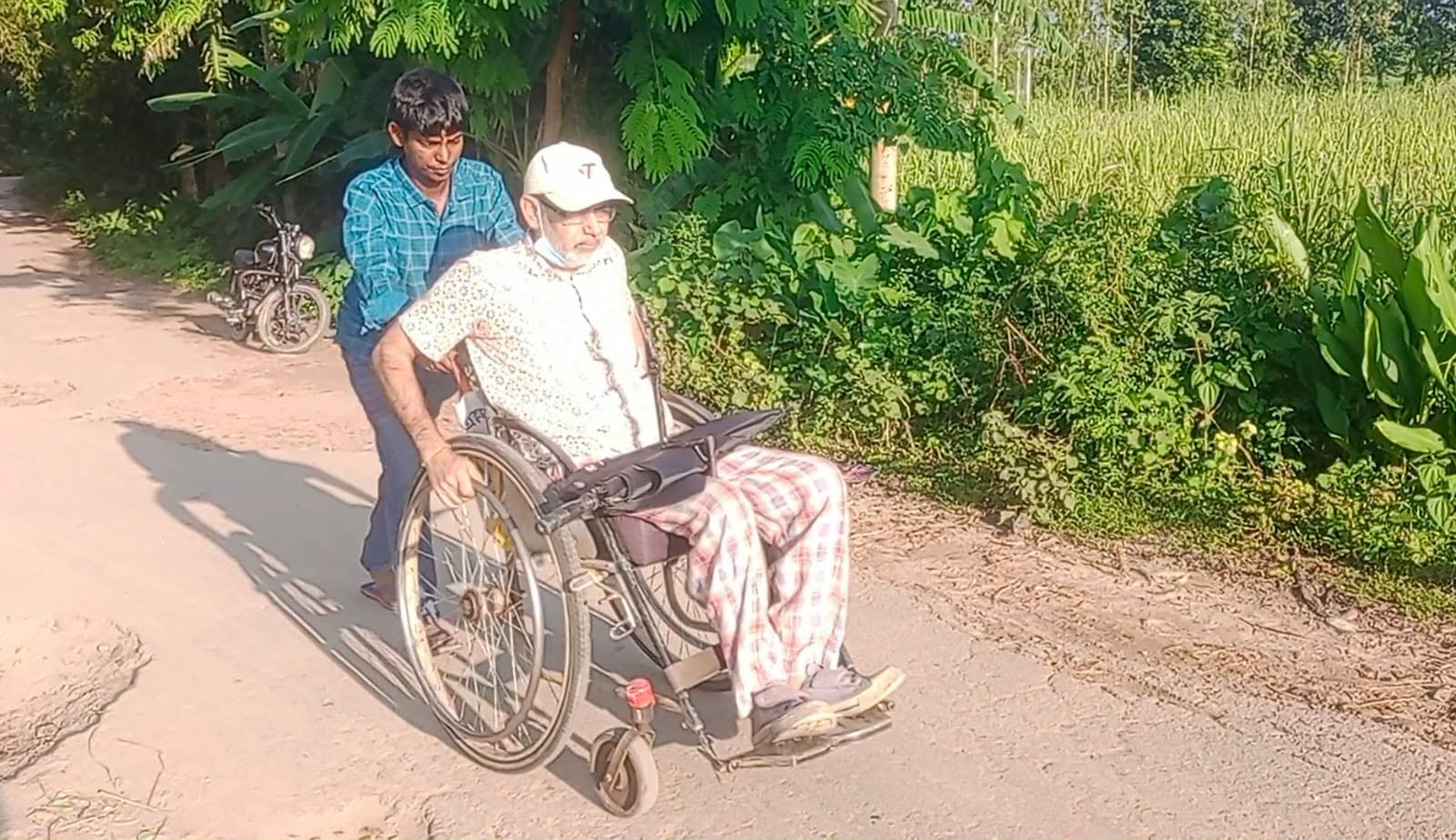 চুনারুঘাটে হুইল চেয়ারেই কাটে শিক্ষকের জীবন